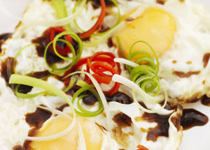 Chinese fried eggs with oyster sauce, spring onions and chill - Recipe