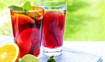 Refreshing fruit punch in two glasses outside